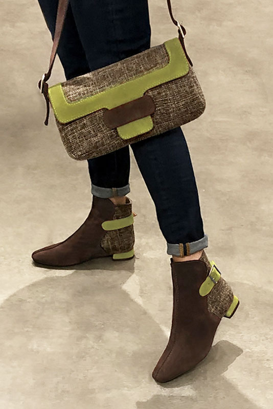 Women's dark brown and pistachio green small luxurious elegant handbag. - Worn view